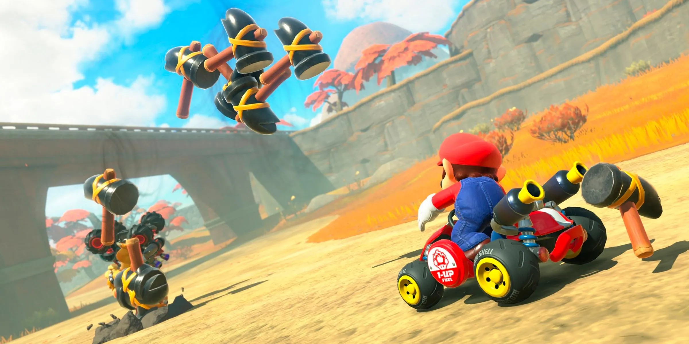Mario sử dụng vật phẩm Búa tấn công Bowser trong Mario Kart World.