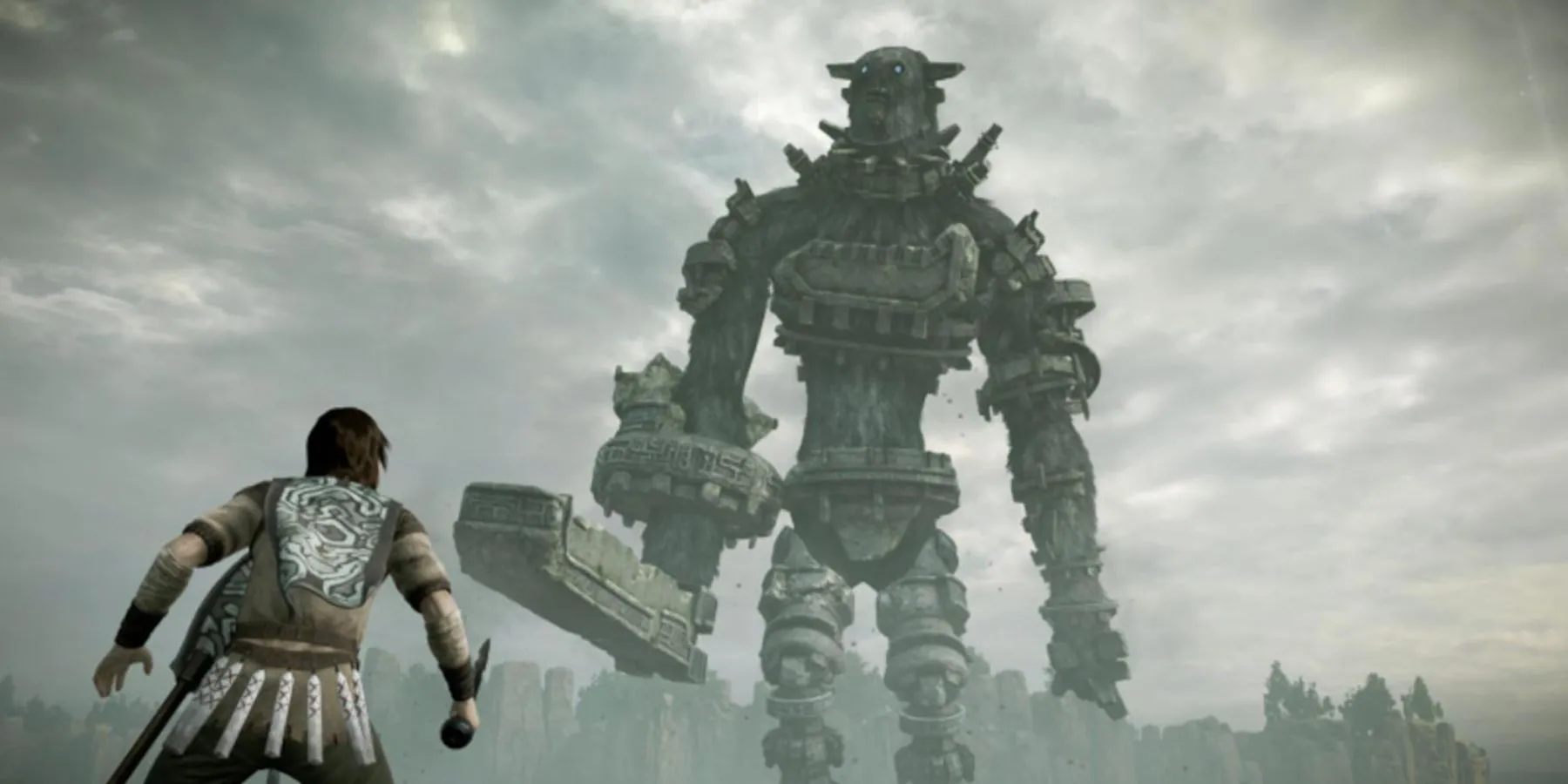 Wander chuẩn bị chiến đấu với một Colossus khổng lồ trong Shadow of the Colossus